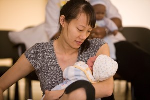 mom holding baby eye to eye